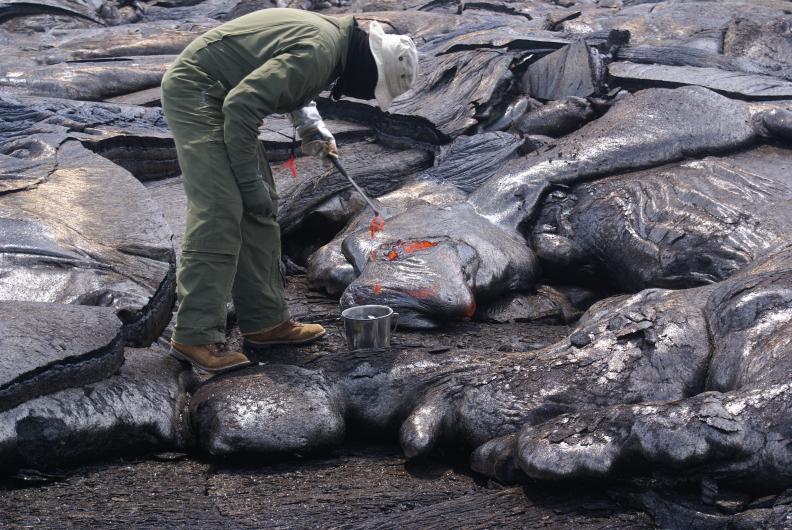 scientists sample lava