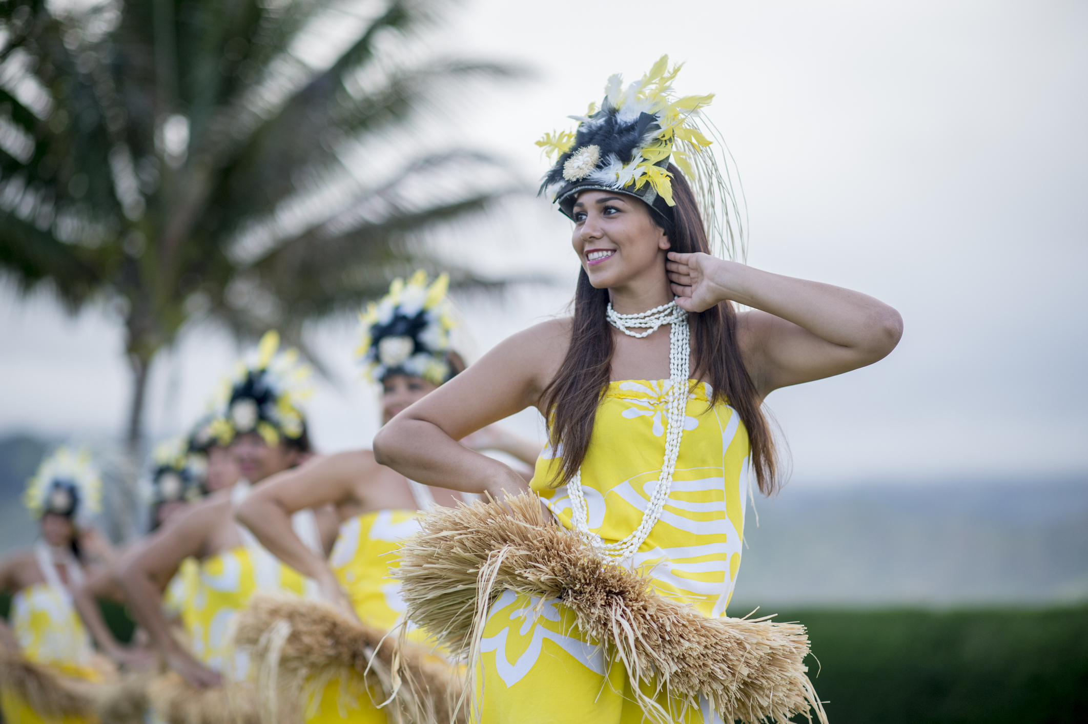 Woman Leading The Luau Performance